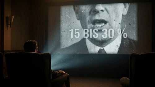 Mund in Nahaufnahme auf einer Kinoleinwand, darüber die Zahl 15 bis 30 Prozent, die beim Lippenlesen angeblich das Maximum des Verstehens bezeichnet.